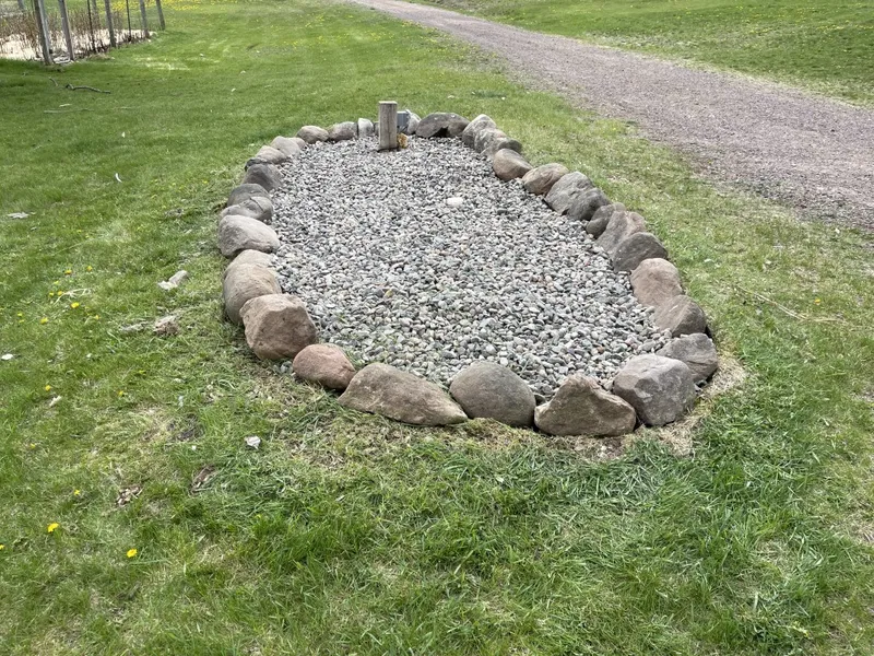 New Rock Bed covering septic access lids